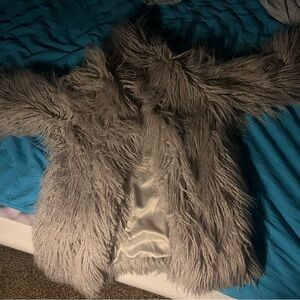 Grey faux fur coat with a faux fur lining